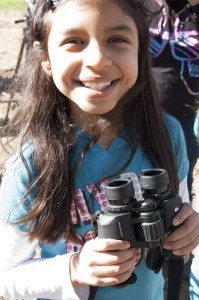 Eco-Ed student learns to use binoculars / Photo by Eva Guralnick