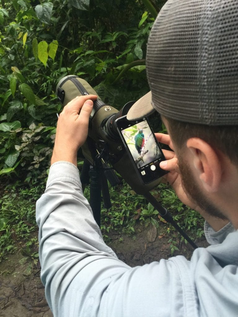 Farley photographingGolden-headed Quetzal with his scope and iPhone, by Krista Jordan