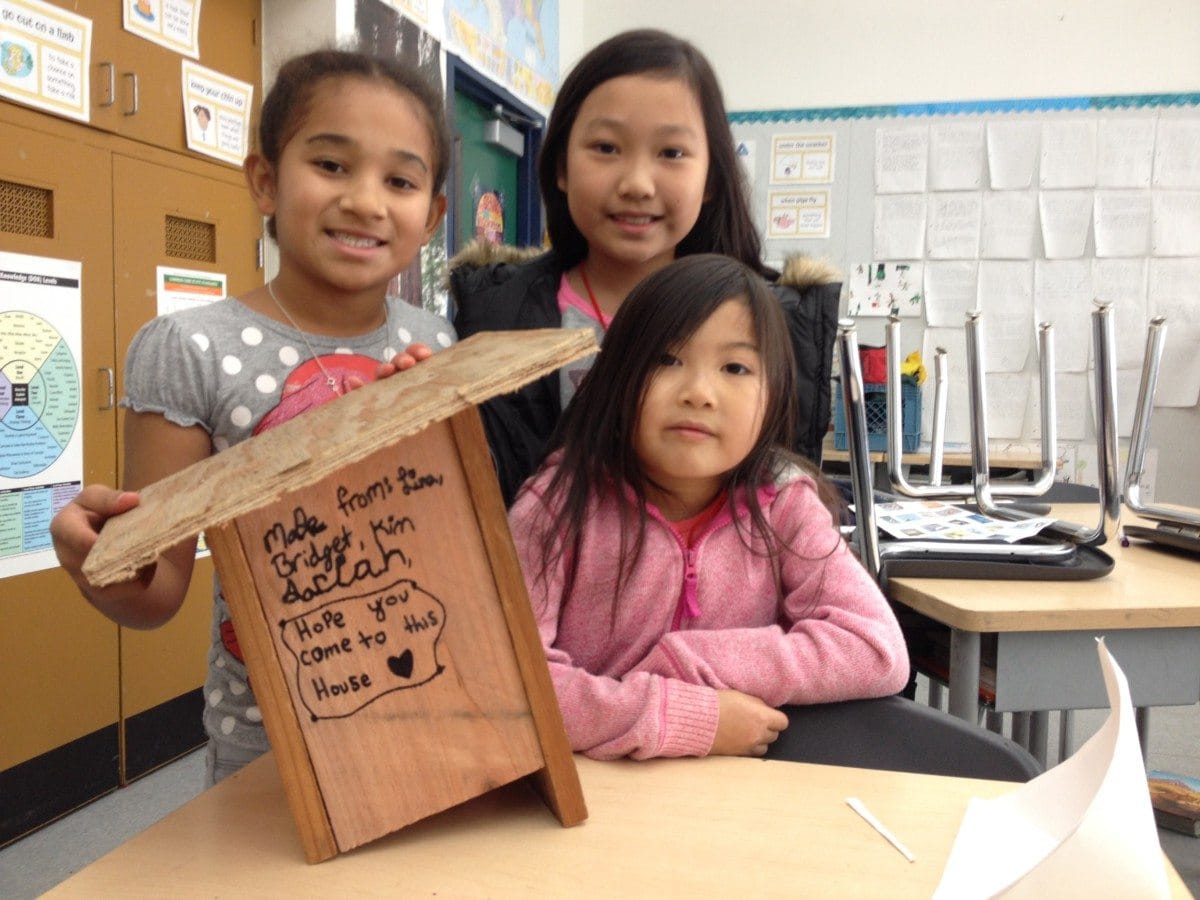 Girls from Bayview Elementary with box that the flycatchers used / Photo by Anthony DeCicco